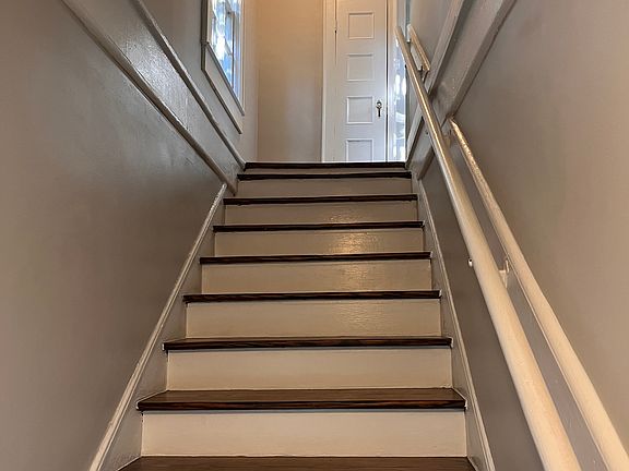 Stairs leading to apartment - Coat closet at top of stairs