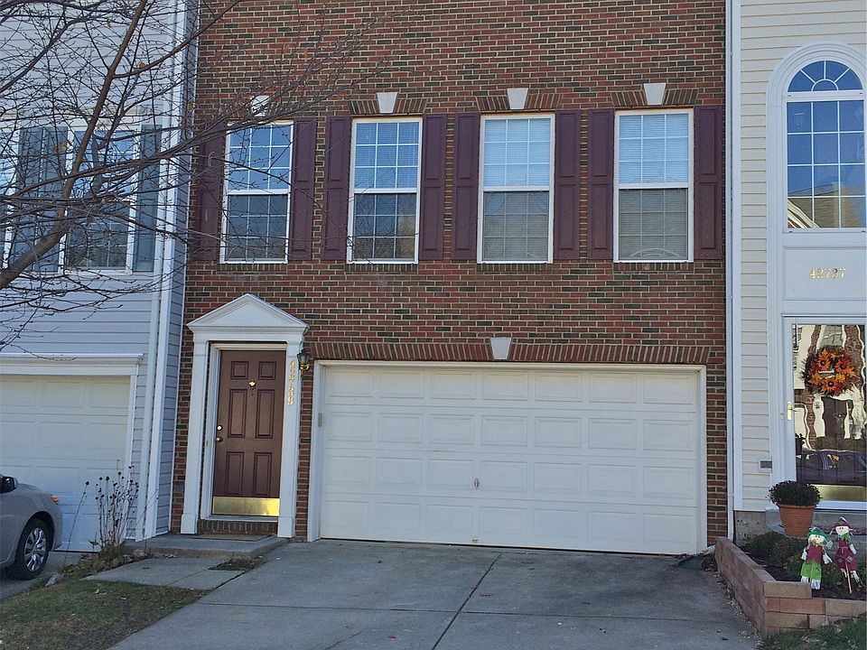 TWO-CAR GARAGE W/BRICK FRONT