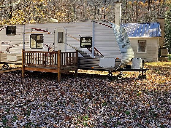 Travel trailer with deck