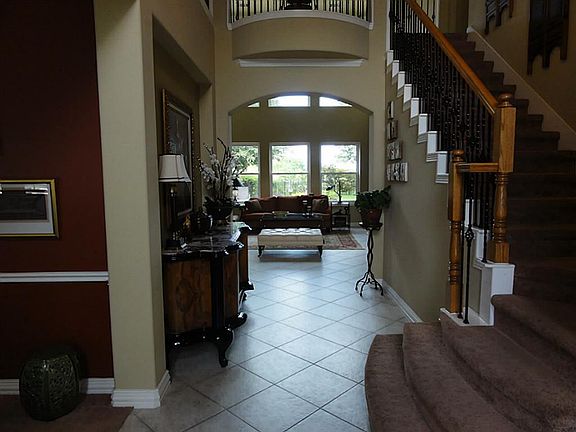 Warm entry with large windows show-casing golf course view!  Decorator colors through-out!