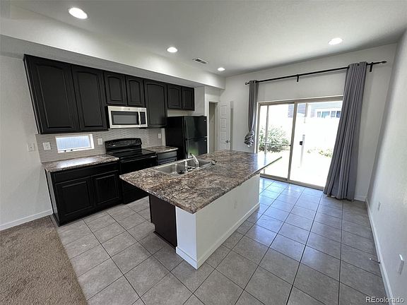 5th image of 4888 N Halifax Court
