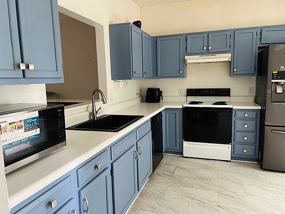 Kitchen with newly painted cabinets