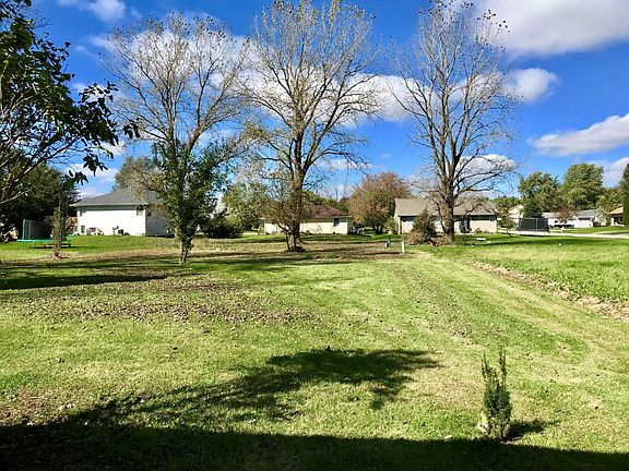 Large backyard with firepit