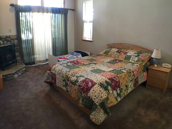 Upstairs bedroom with full size bed.