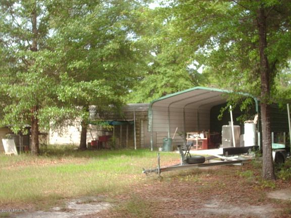 2 Car Carport W/ Shed