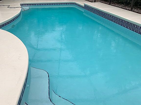 Screened pool resurfaced2020