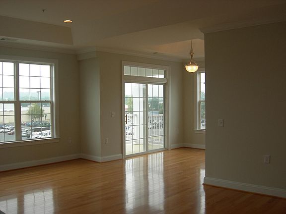 Hardwood floors, recessed lighting, and tray ceilings.