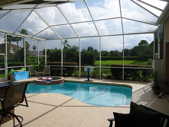 Pool overlooking pond