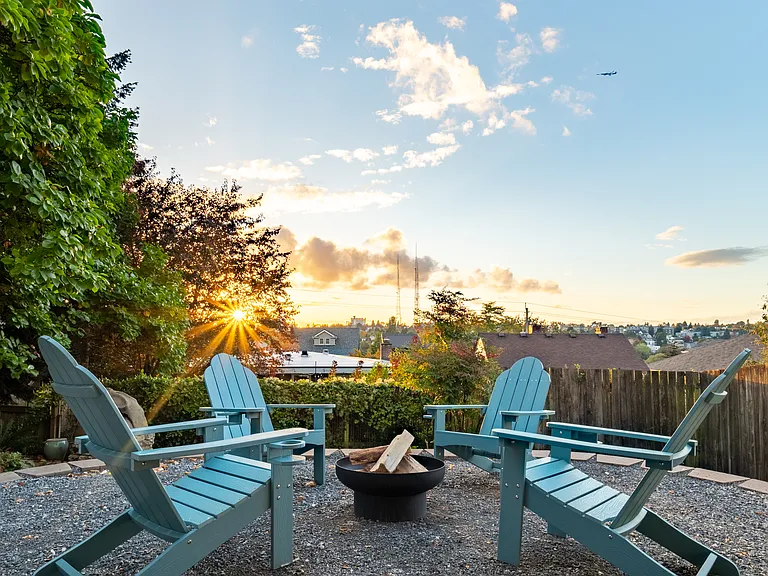Unwind in the outdoor space with a campfire