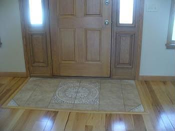 When you walk into this beautiful home you will find this beautiful tile floor at the entrance.