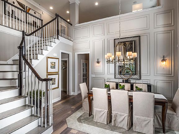 Two-story foyer and dining room