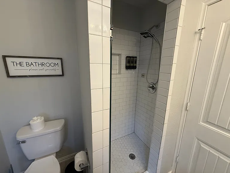 Full Bathroom 2 - walk-in shower & bathroom essentials.
