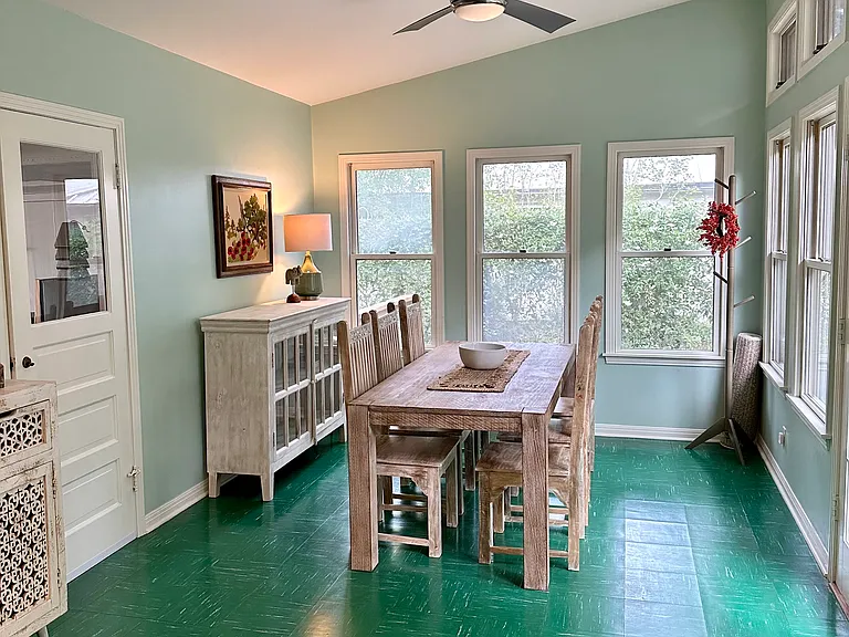 Large Eat-in area off Kitchen (door to garage at left and to backyard at right)