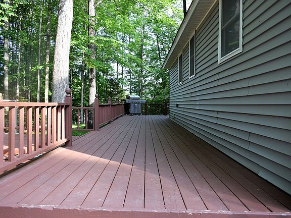 Deck on 3 sides of house