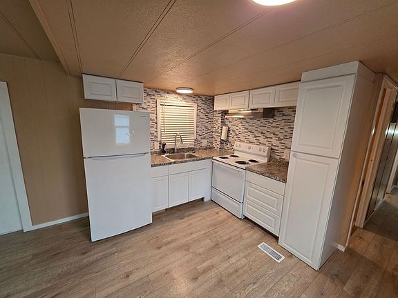 3rd image of 17223 E 4th Ave