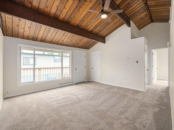 Can you imagine the spacious feeling of this room with those gorgeous cedar ceilings?