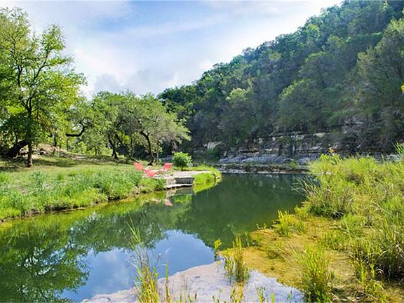 Own on both sides of beautiful Lone Man Creek
