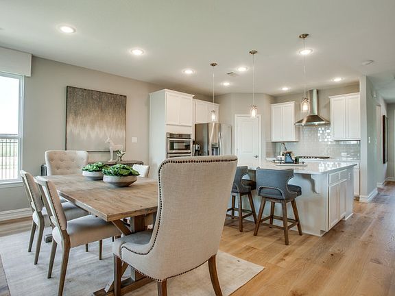 Model Representation - Spacious dining room with space to entertain