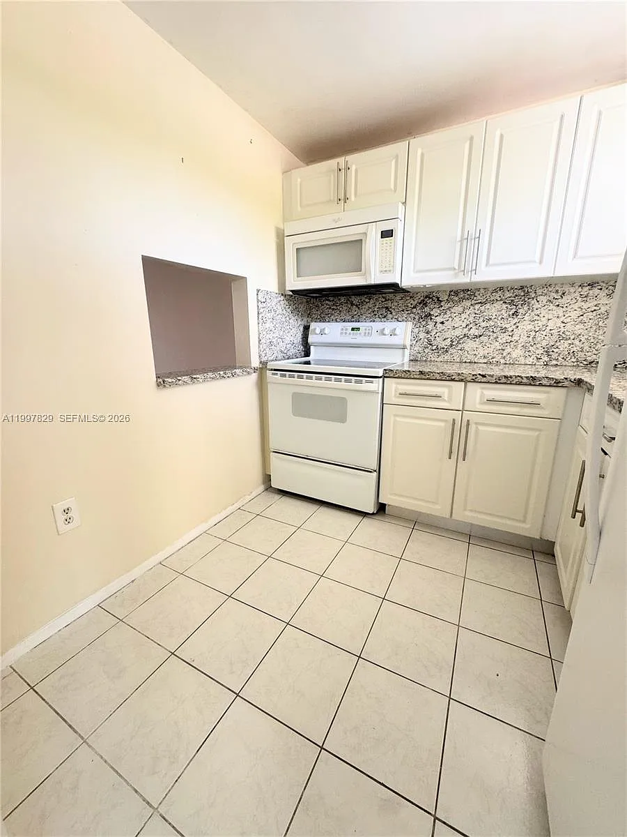 Building Photo - 8200 Sunrise Lakes Blvd #207