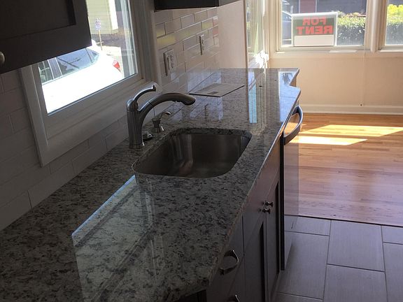 Updated kitchen. Cstm cabnts, granite counters.