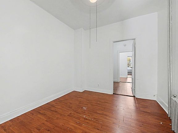 2nd image of 64-24 Madison St #6FAM-4VACANT