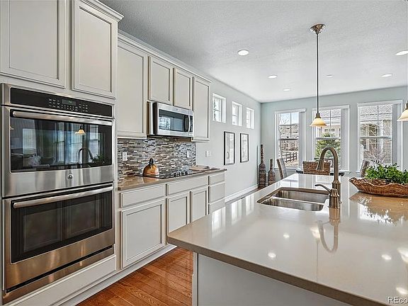 Double ovens and large island make this kitchen perfect for entertaining