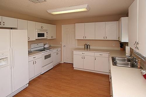 BIG Kitchen - White Cabinetry with Attractive Nickle Hardware!