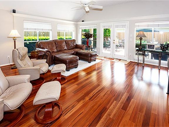 Gorgeous Tiger wood flooring, with a hardness rating of 4+, is located in the Den, both Formals and 