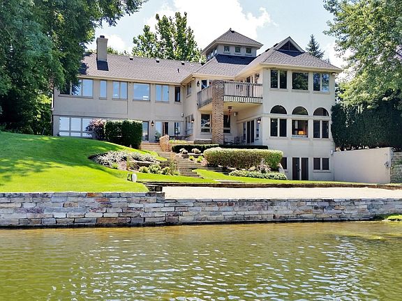 Impressive 6000 Sq Ft Lakefront Home on Park Lake! 3 Levels of fine living.