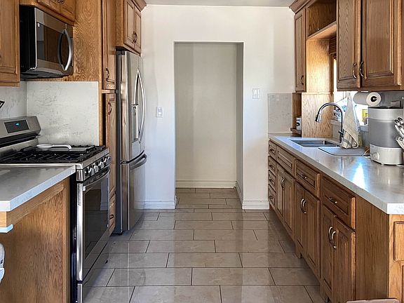 New stainless steel appliances and granite countertops.