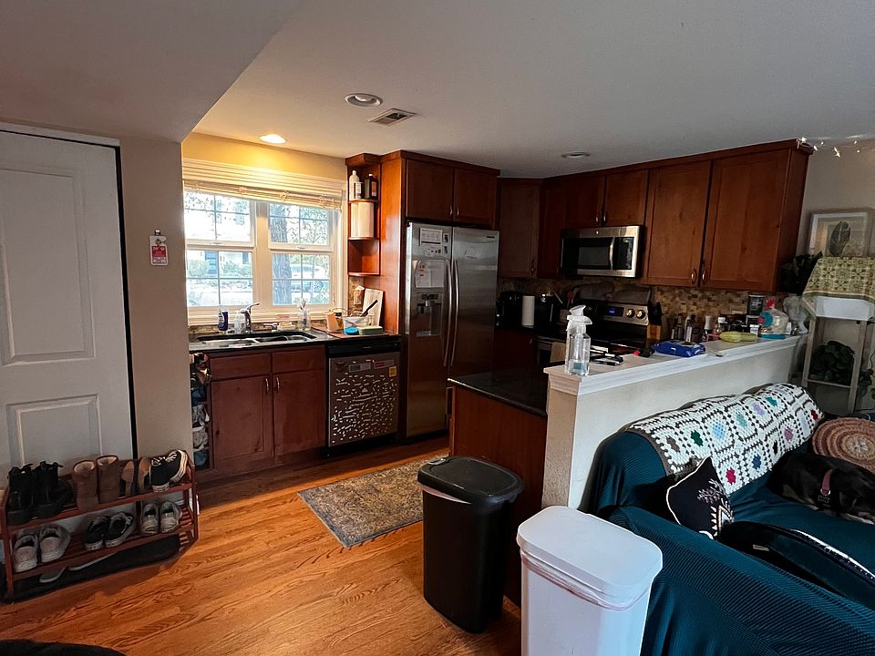 Updated kitchen with SS appliances, granite counters and lots of cabinets