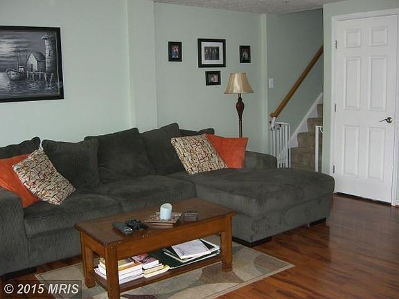 Living Room has HARDWOOD FLOORS