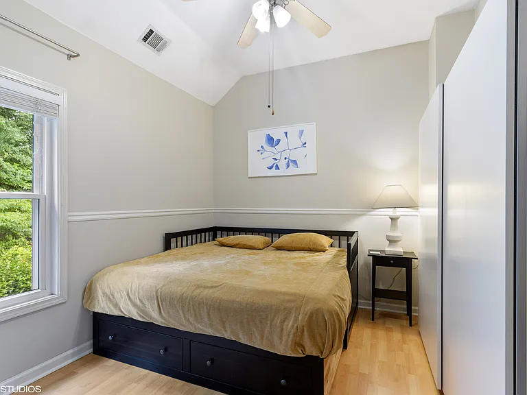 Second bedroom. Note, since this picture was taken, the laminated wood in this room was replaced with solid white oak hardwood floors.