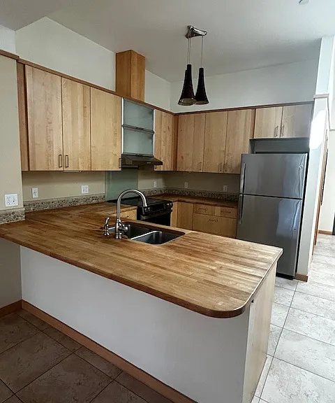 View from Kitchen, great lighting, new appliances, and new ceiling fan with LED light