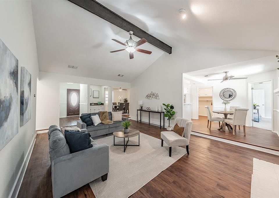 Living Room with view of dining and kitchen
