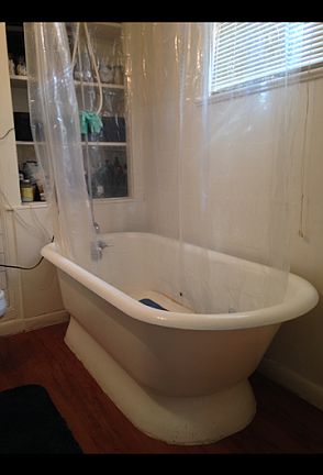1920's cast iron soaker tub!