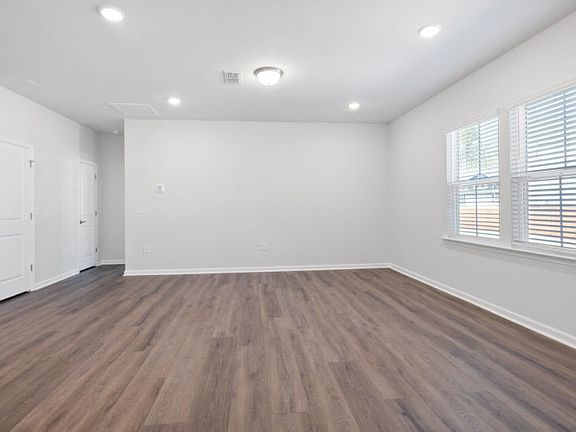 Spacious Great Room with Natural Light - Model Representation