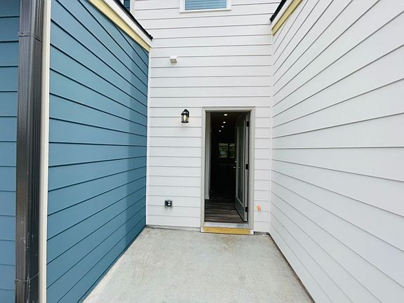 Back Door with Concrete Slab.