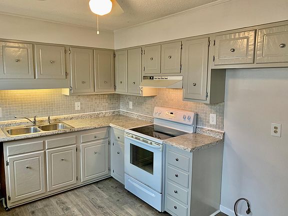 Kitchen with new dishwasher and refrigerator