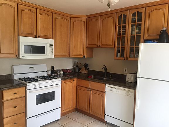 Lots of cabinets, gas stove, granite countertops