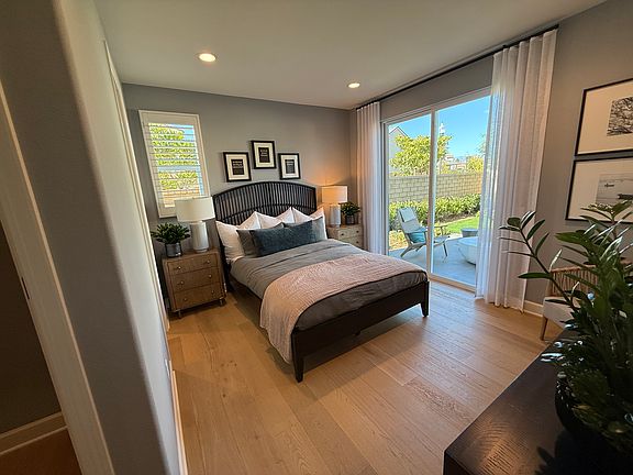 This is exact size and layout of bedroom, however there are no slider doors. This is model home, as our space is currently occupied with renter.