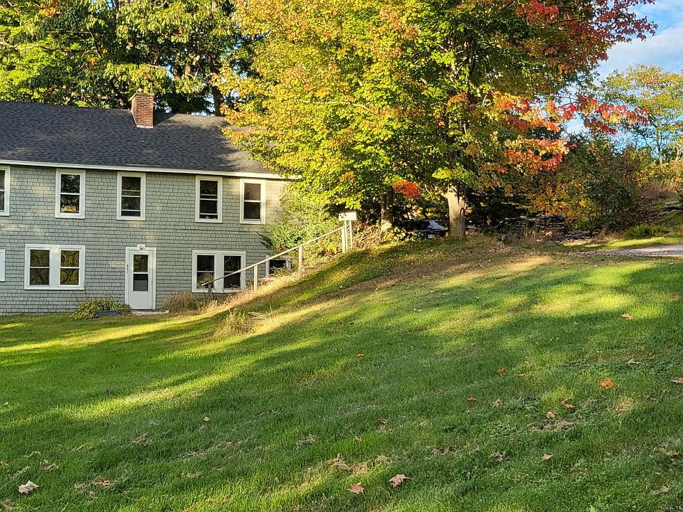 Lower floor is 6B. Exterior staircase access from shared parking area.