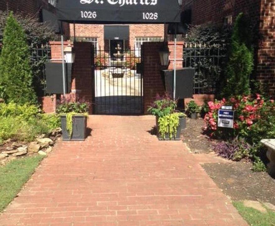 Courtyard entry to building with security gate