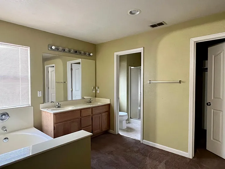 Master Bathroom with Two Closets