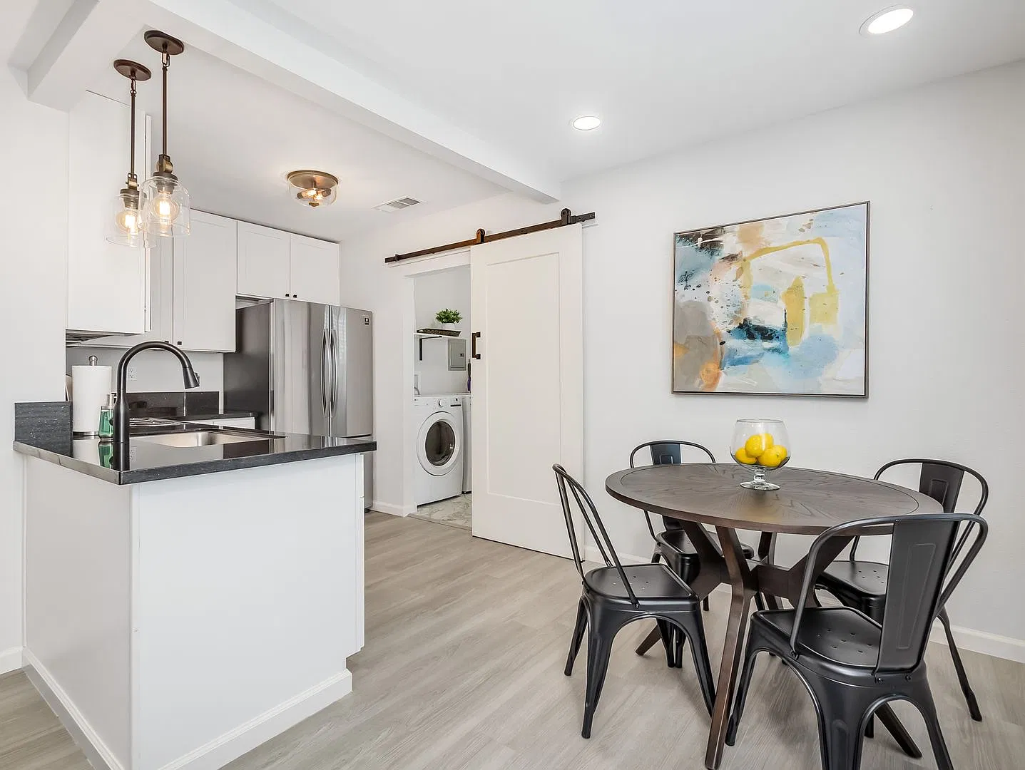 Desirable home on quiet tree lined street, centrally located — Photo 4