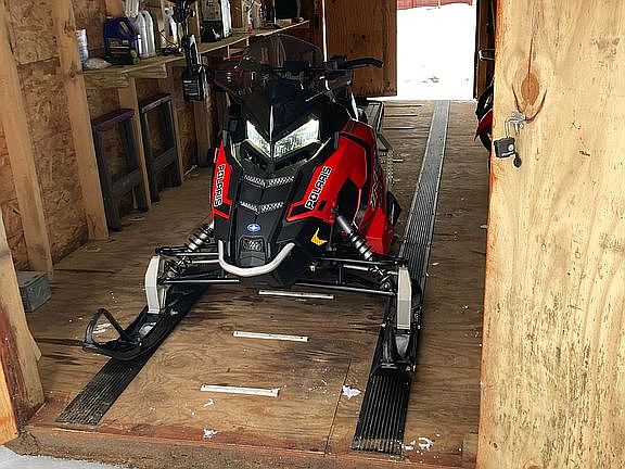 Shed with included snowmobil
