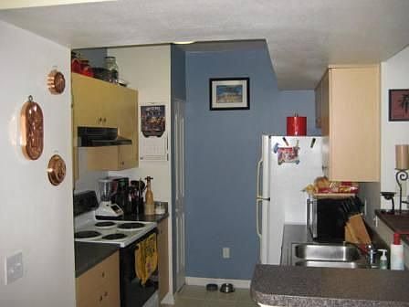 Kitchen before tenant moved out