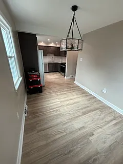 Dining room leading to kitchen