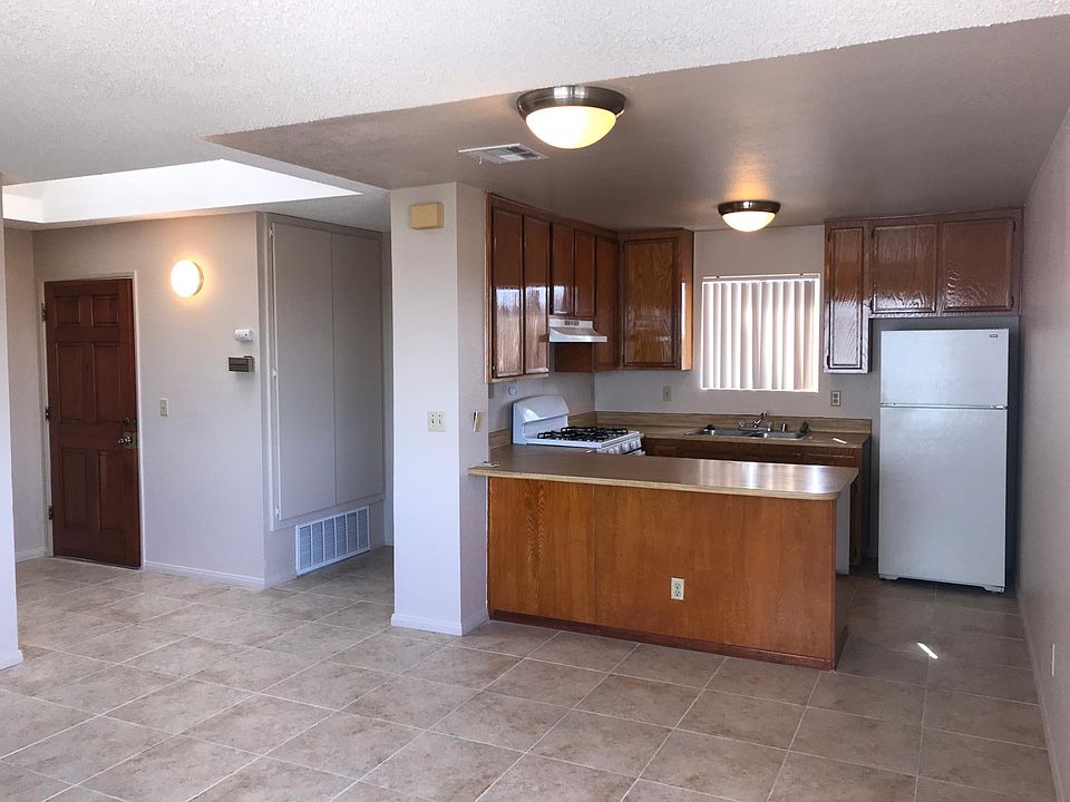 Front door and kitchen
