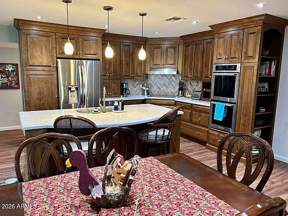 5th image of 10009 W Pleasant Valley Rd